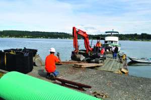 Installer Uses Technology To Place A Septic System On A Small Waterfront Lot On The Puget Sound