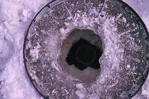 Ice-Covered Septic Tanks Freeze Pumpers in Their Tracks