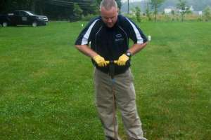 Sept020 Eric Garrett of Home Land Septic Consulting probing a drainfield