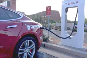 Tesla with gps insight logo